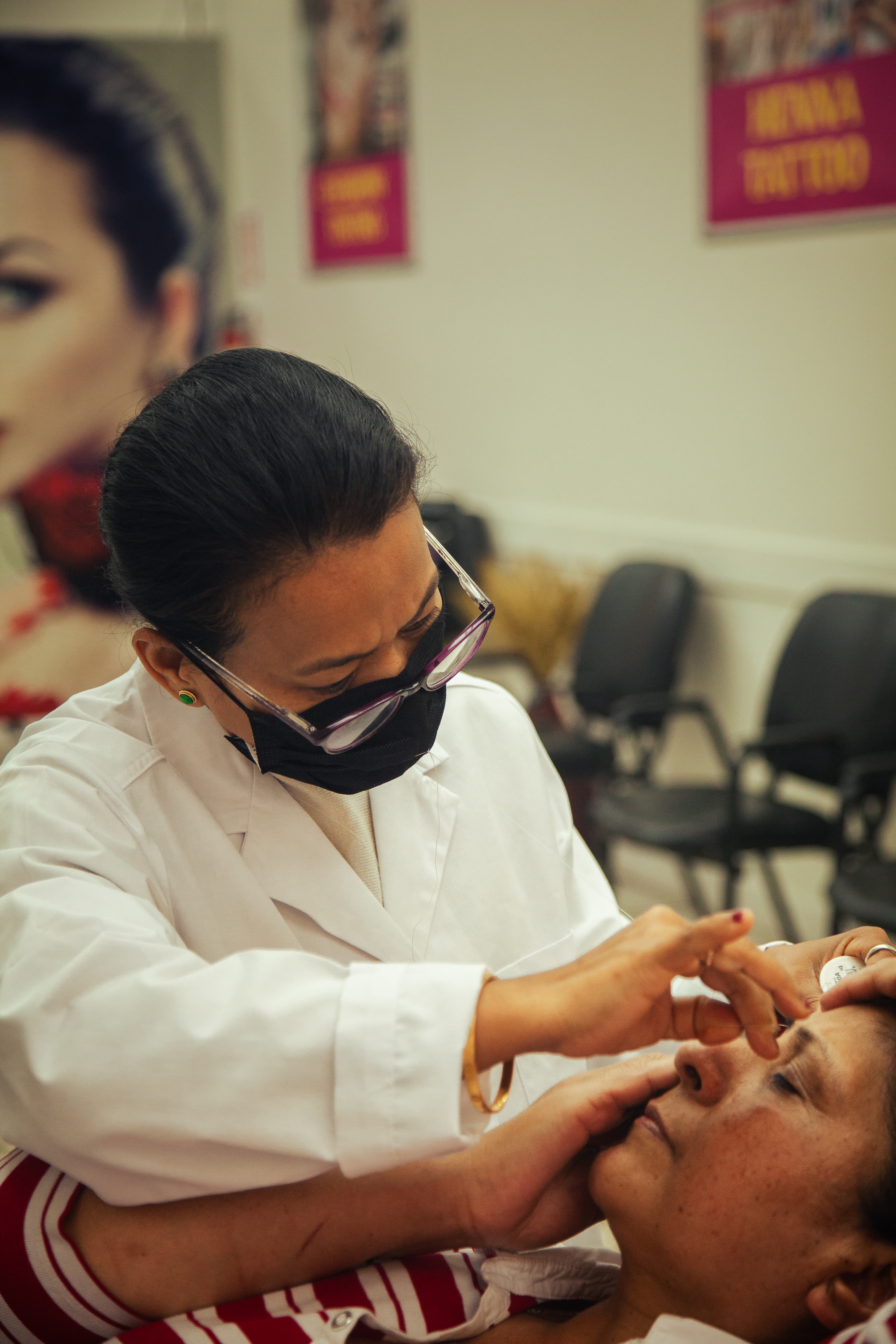 Reva threading technician working on a client